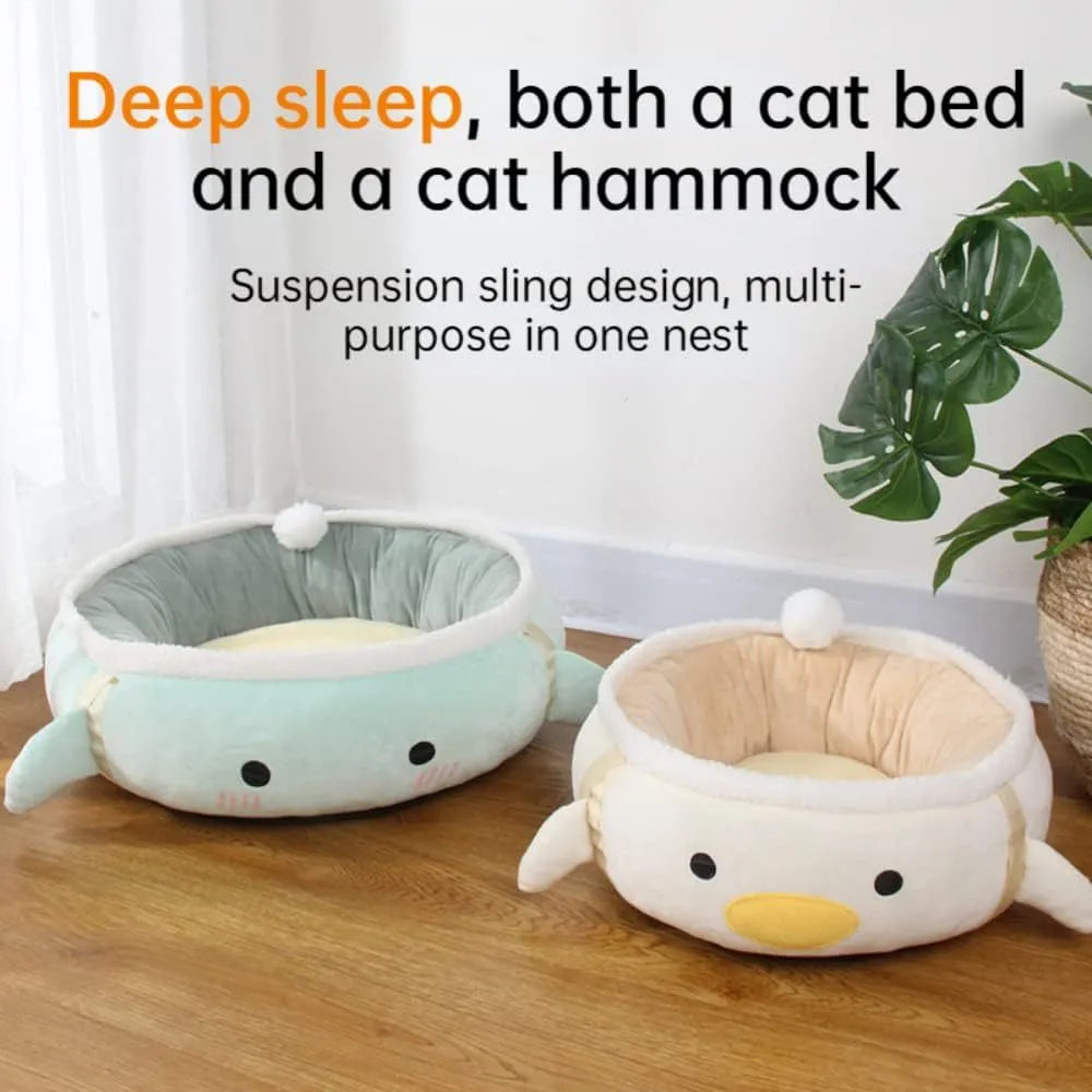 Green chick and dinosaur shaped cat bed shown both flat as a nest and hanging as a hammock for small pets.