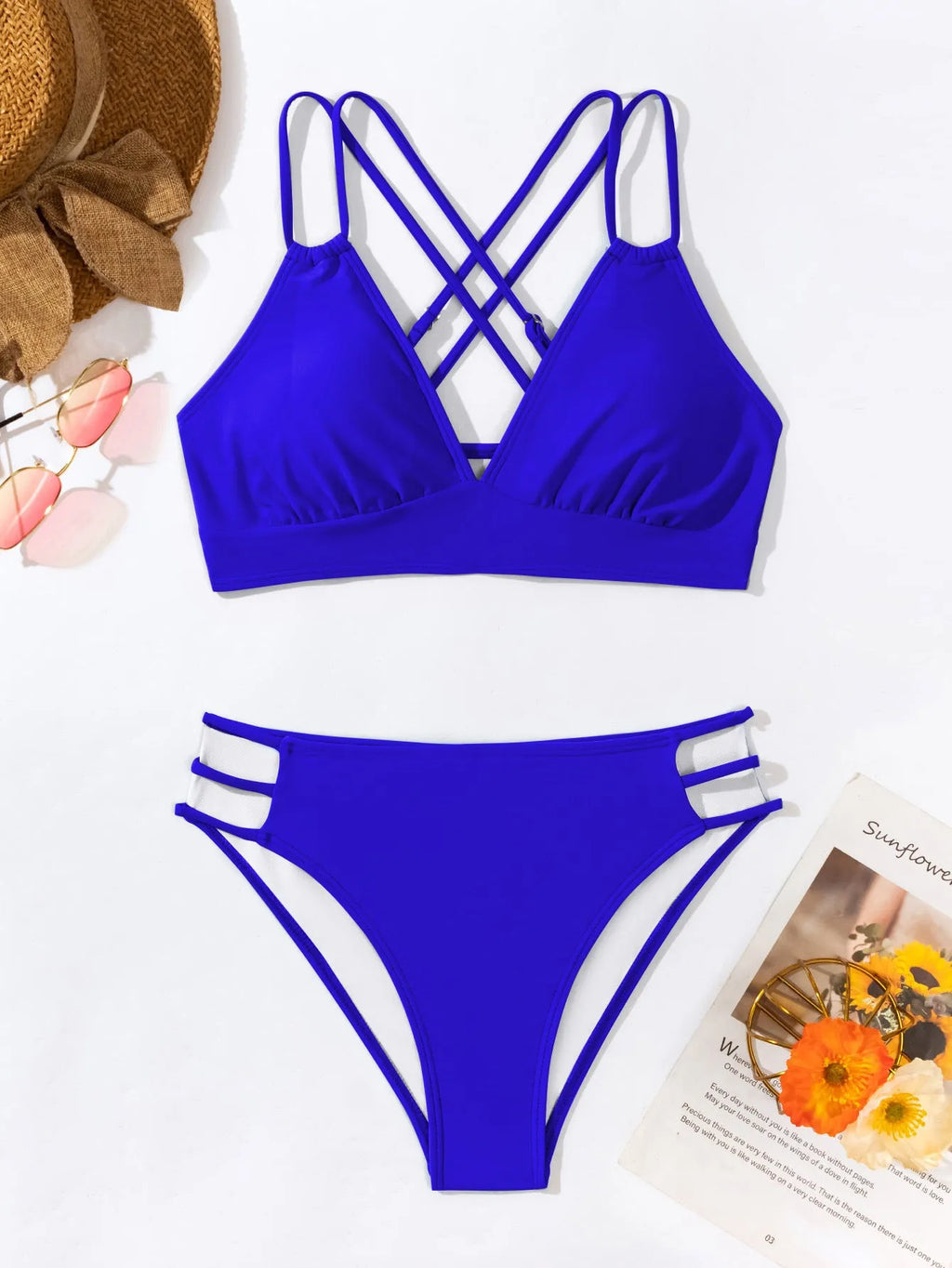 Adult women's black V-neck halter bikini with split-leg high-cut shorts.