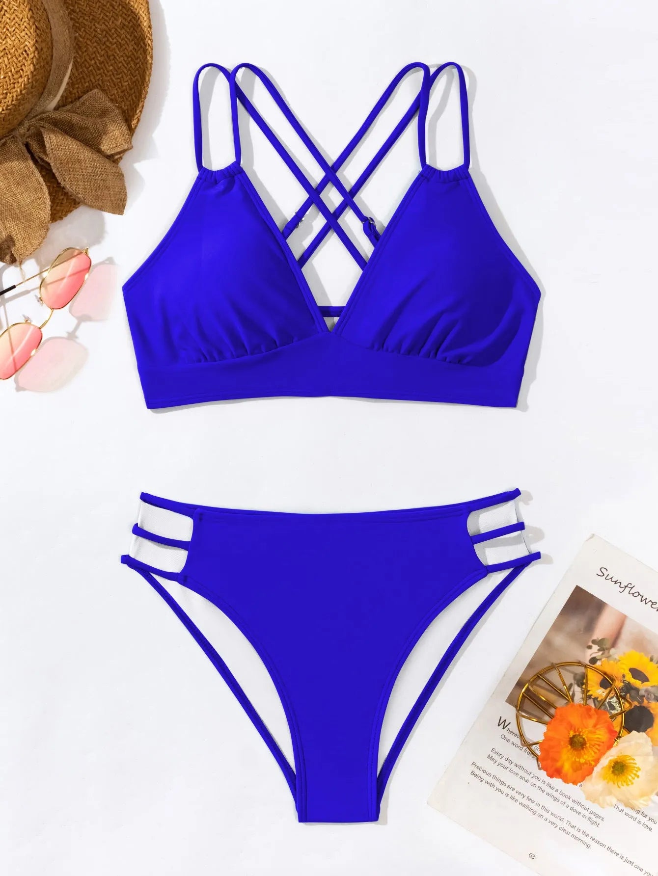 Adult women's black V-neck halter bikini with split-leg high-cut shorts.