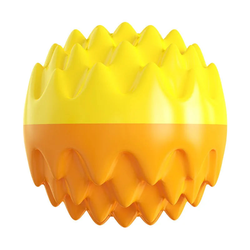 Blue spiky rubber dog ball with squeaker for teeth cleaning and water fetch