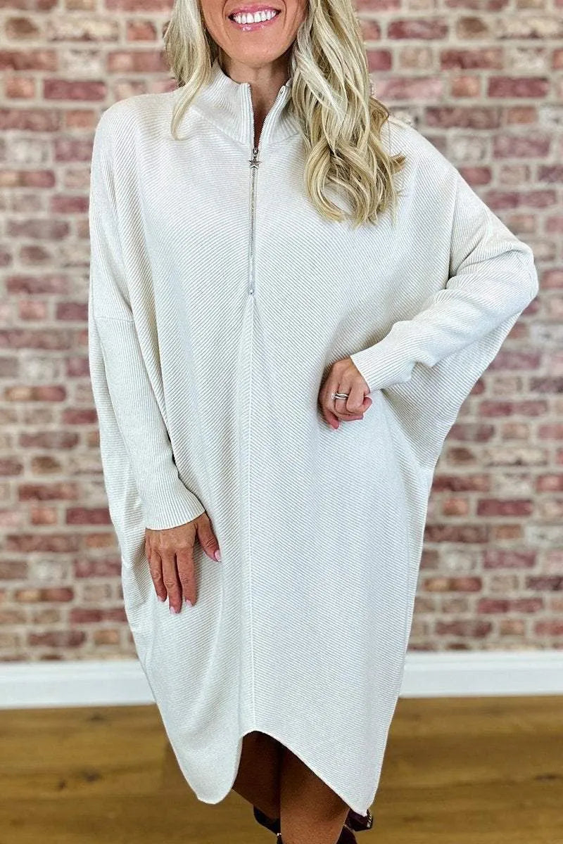 Women's solid colour loose knitted dress with raglan sleeves shown in dark green