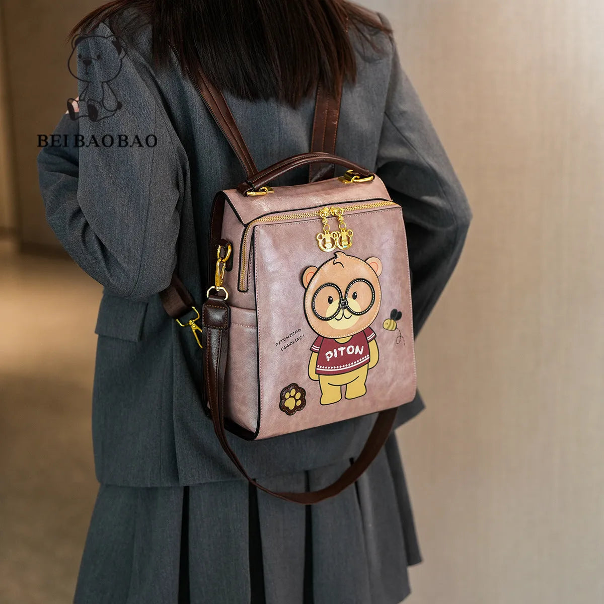 Cartoon bear female large capacity retro sling backpack in creamy-white with sewing line detail