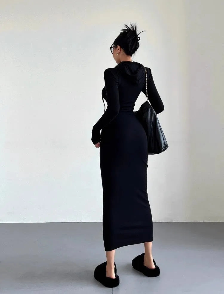 Women's light grey hooded long sleeve sheath dress with high waist on a model