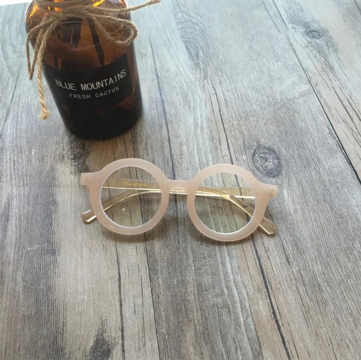 Retro round frame glasses with UV400 protection and anti-blue light features in multiple colour options