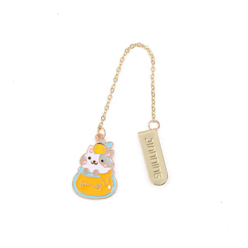 Jane Lime Foodie Cat metal bookmark with cartoon pendant in four colour variations on a white background.