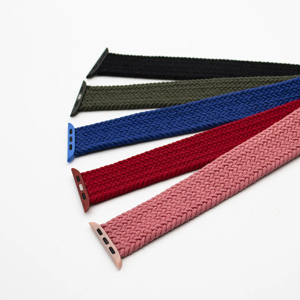 Nylon Apple Watch strap in army green showing elastic woven texture and plastic head