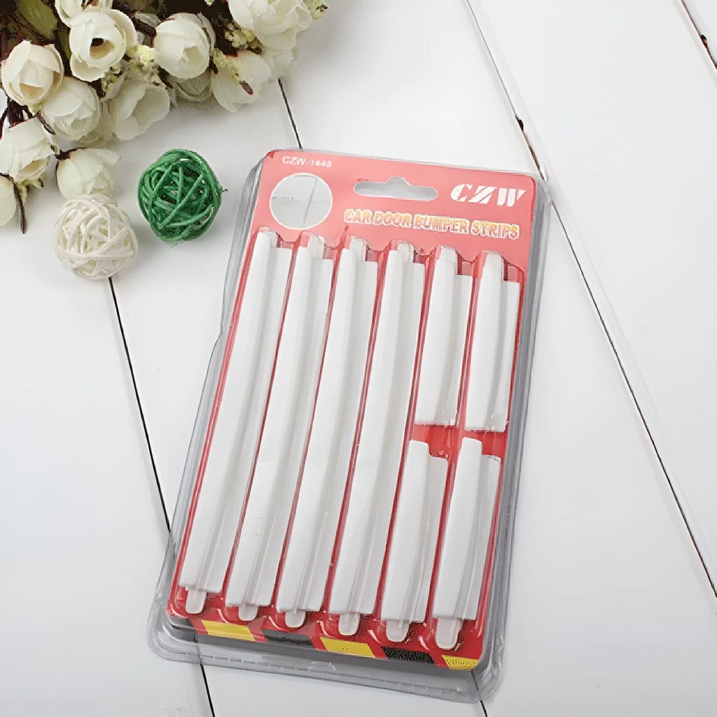 White plastic adhesive car door edge protection bumper strip roll.