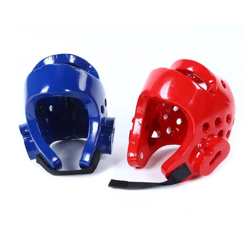 Karate protective gear set showing red helmet, boxing gloves and leg guard for martial arts training