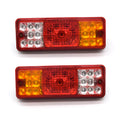 Black semi-closed taillight for electric tricycle, rear view showing housing.