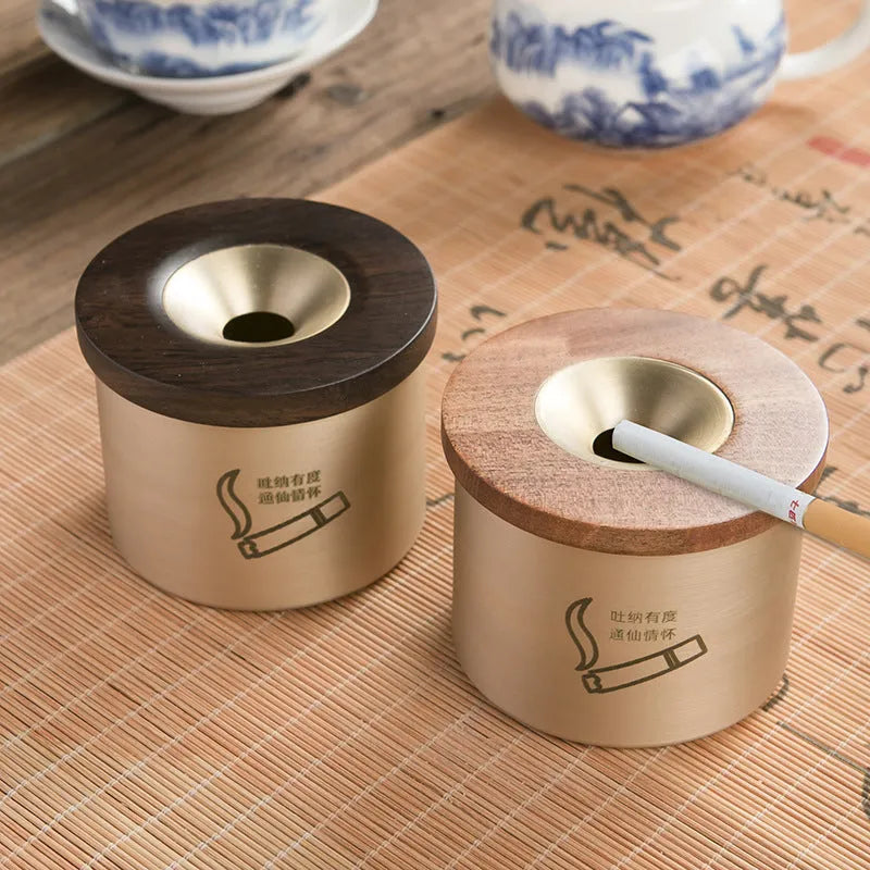 Brass retro ashtray with a wooden lid, available in black or rosewood finish.