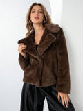 Women's loose-fitting short faux fur coat in rose red colour on a hanger.