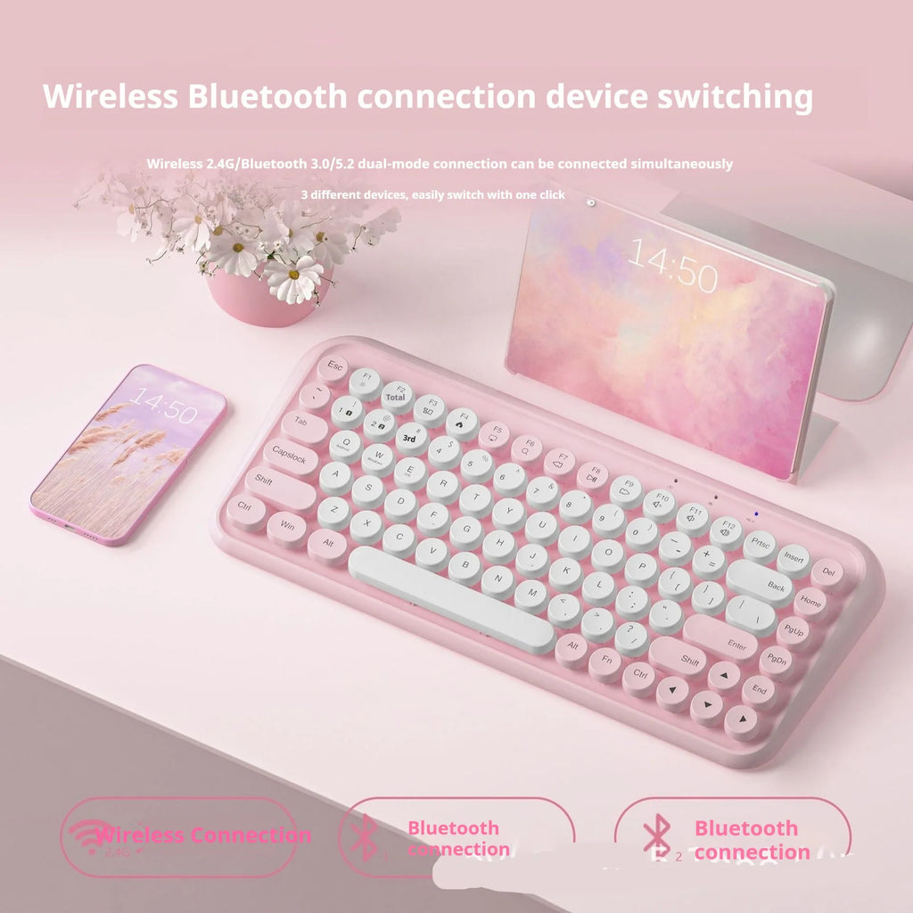 Pink wireless Bluetooth keyboard with 84 keys showing compact dimensions