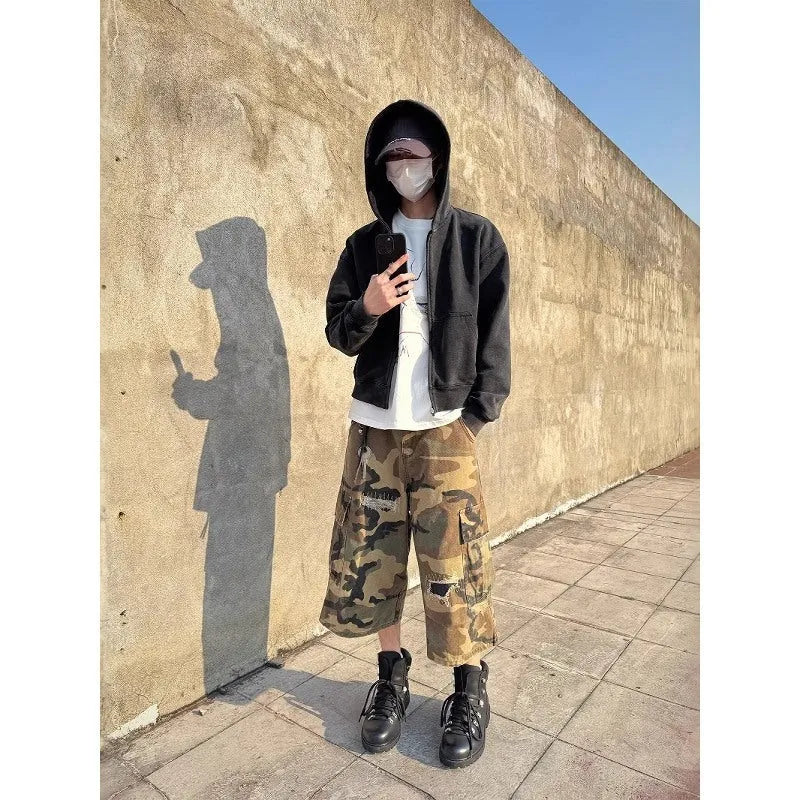 Men's camouflage cropped jeans with retro patch and ripped detailing in straight-leg loose fit