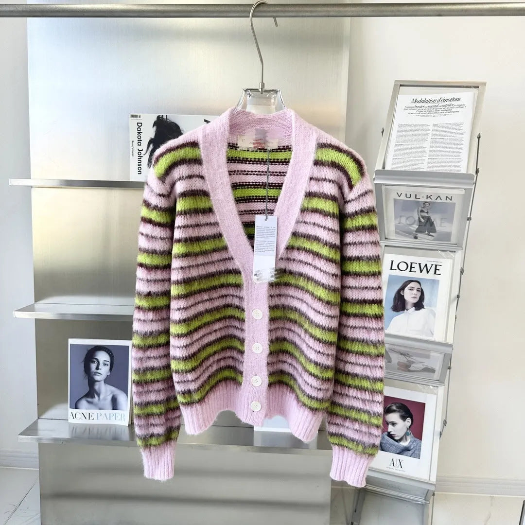 Pink women's wool knitted cardigan and pullover sweater with contrast colour detail on hanger