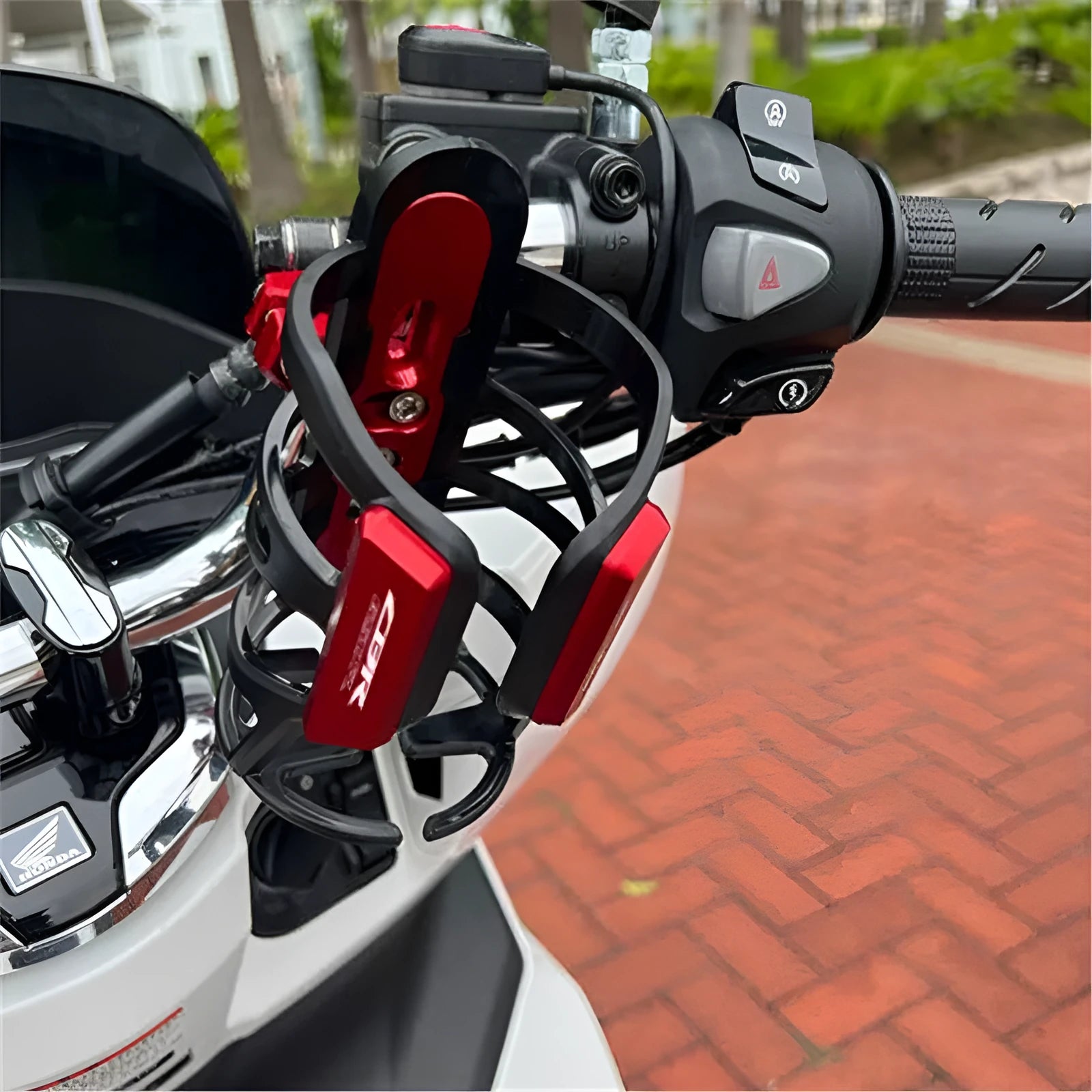 Water bottle cage for Honda X-ADV750 and XADV150 scooter bumper modification in multiple colour options