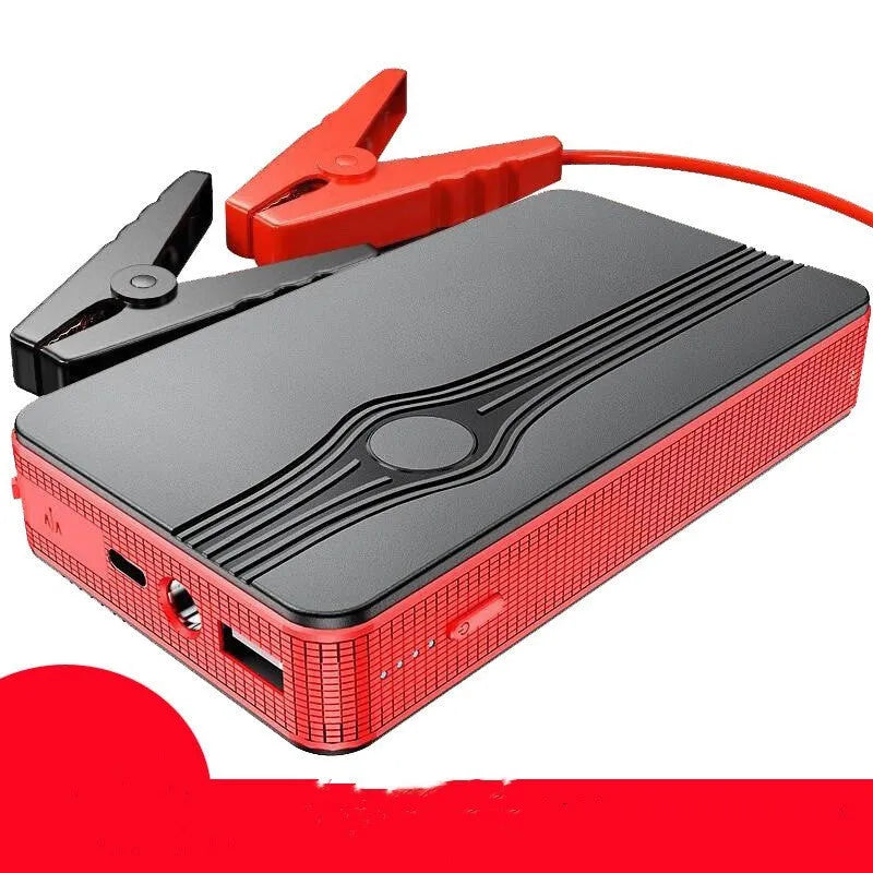 Red K4-E automobile emergency starting power supply unit with display, shown with data cable.