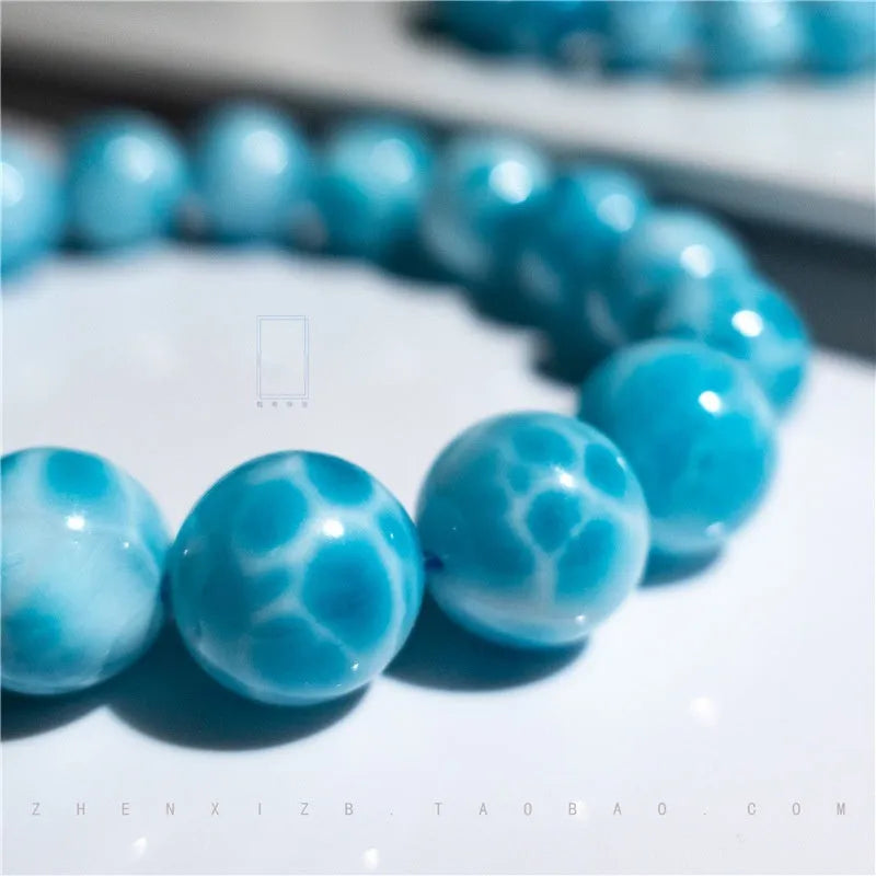 Blue bodhi bracelet with natural crystal sea-pattern stones and pearl accents