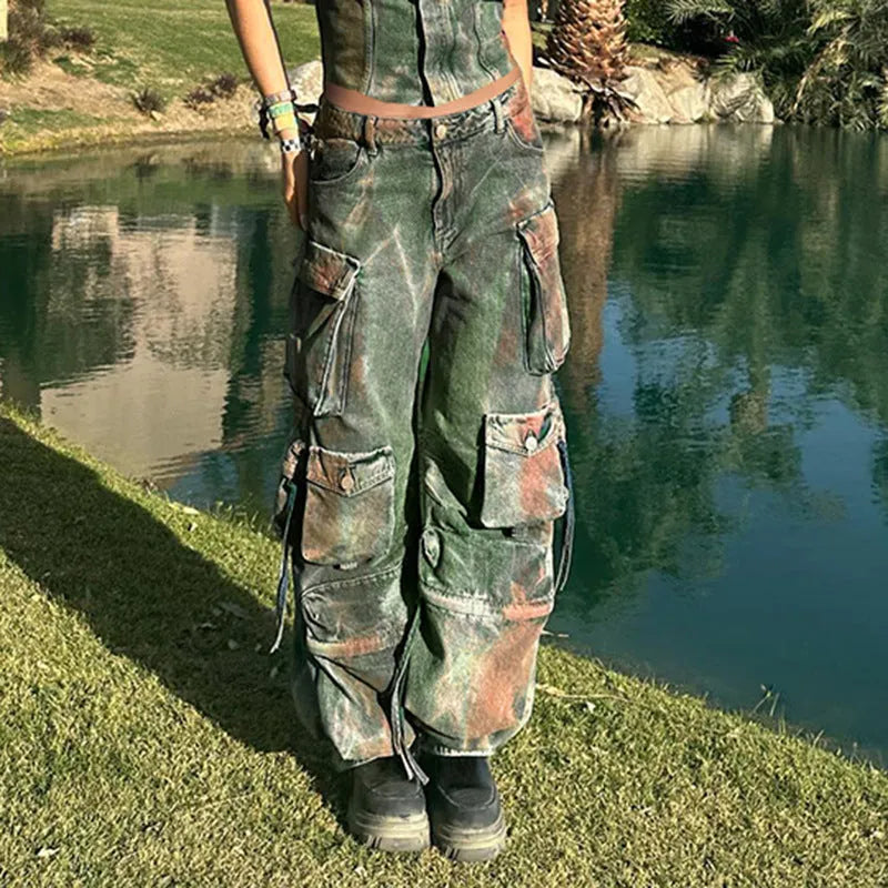 Loose cargo denim trousers with gradient colour pockets and multiple utility compartments