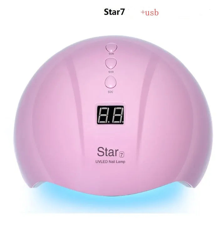 Metallic gold foil number 5 balloon and pink star balloon floating with helium ribbon.