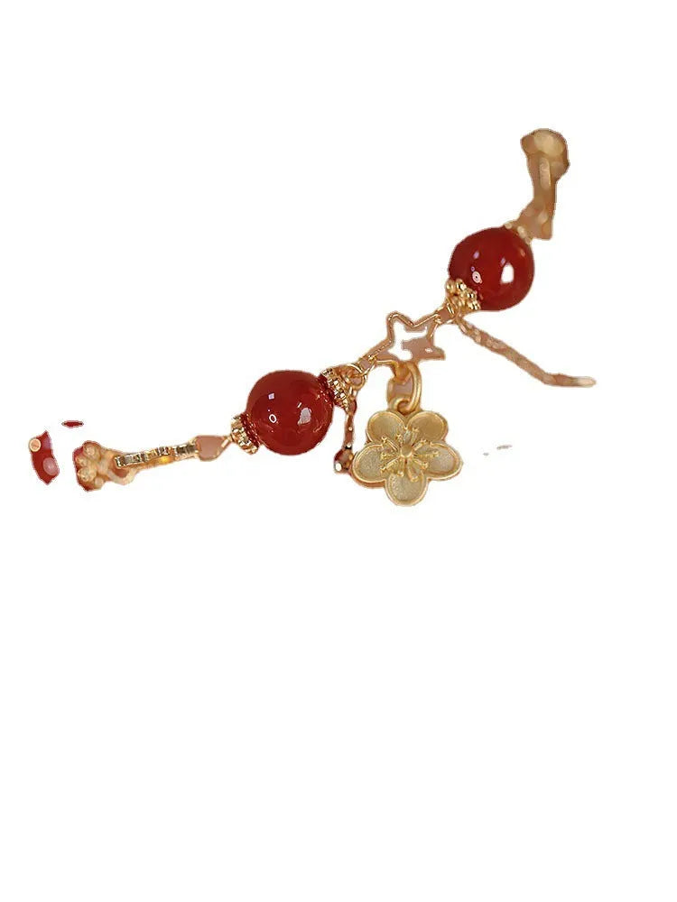 A red agate double layer bracelet with floral details for women.