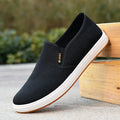 Men's black and blue canvas slip-on shoes with round toe and composite soles