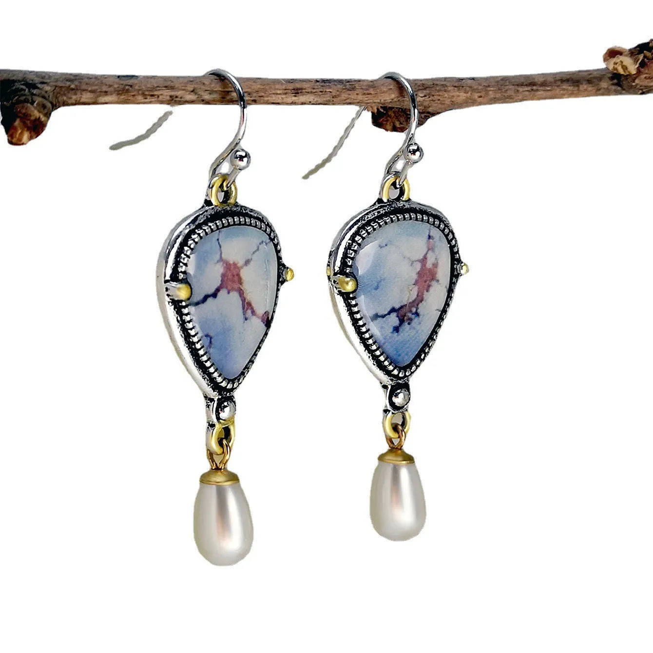 Women's lavender turquoise and white pearl drop earrings with geometric retro design.
