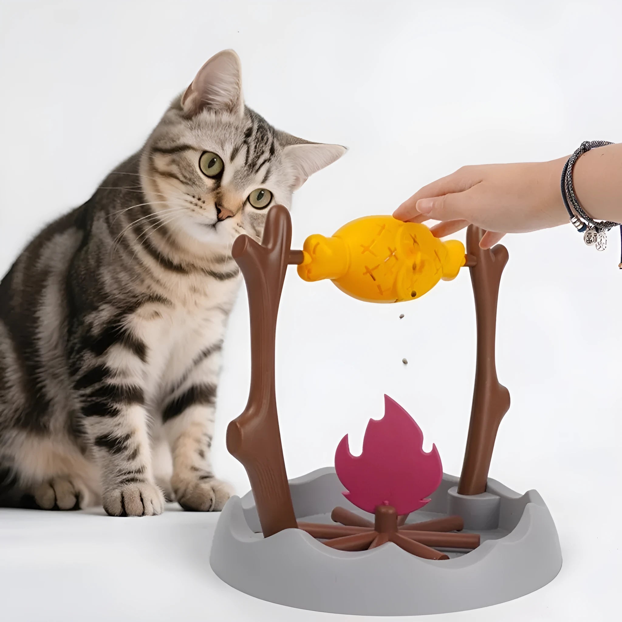Tumbling leakage food feeder cat toy measuring 30cm wide with treat dispensing mechanism