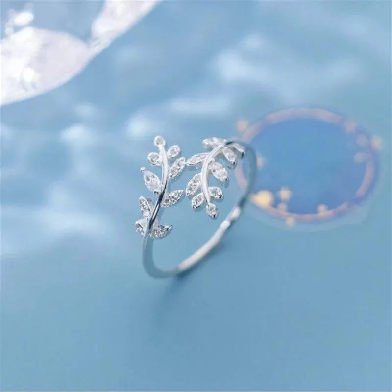 Women's geometric leaf branch ring in electroplated copper with silver or gold finish options