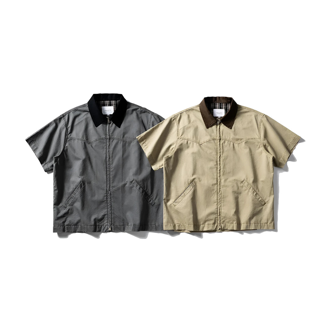 Teenager wearing a khaki loose-fit short sleeve cotton overalls shirt cardigan.