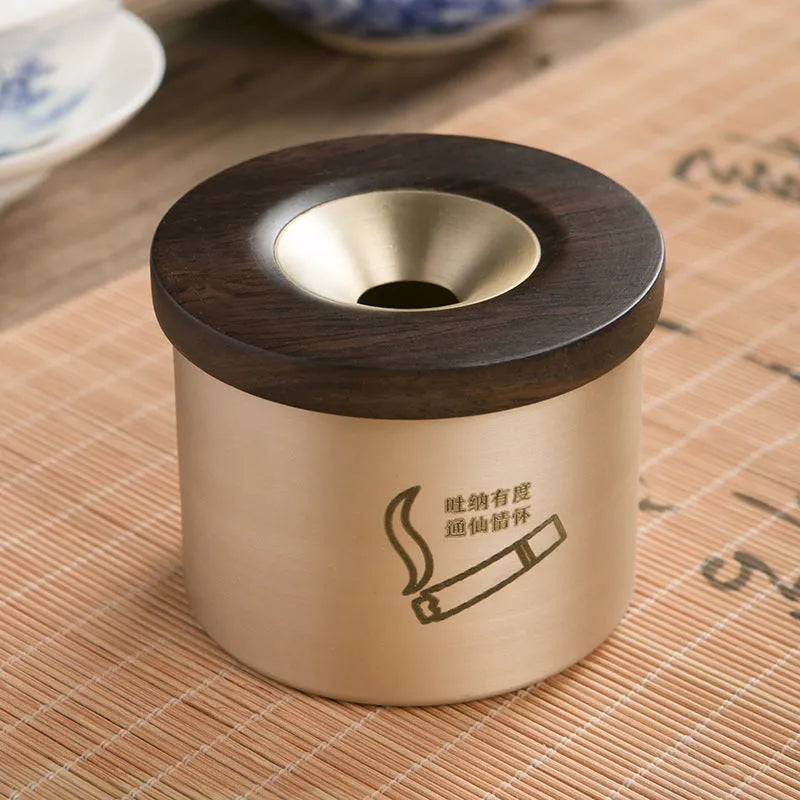 Brass retro ashtray with a wooden lid, available in black or rosewood finish.