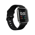 Black waterproof smart bracelet with 1.4-inch colour screen and silicone strap on a wrist
