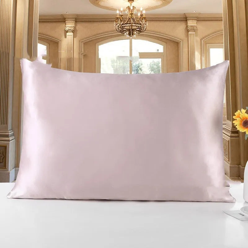 19 M double-sided silk pillowcase in apricot colour, showing envelope closure and smooth fabric texture.