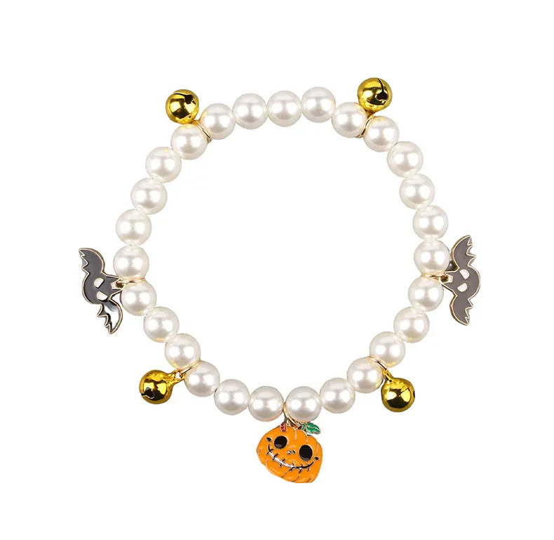 Purple Halloween cat collar with simulated pearl necklace and pumpkin ghost design for pets