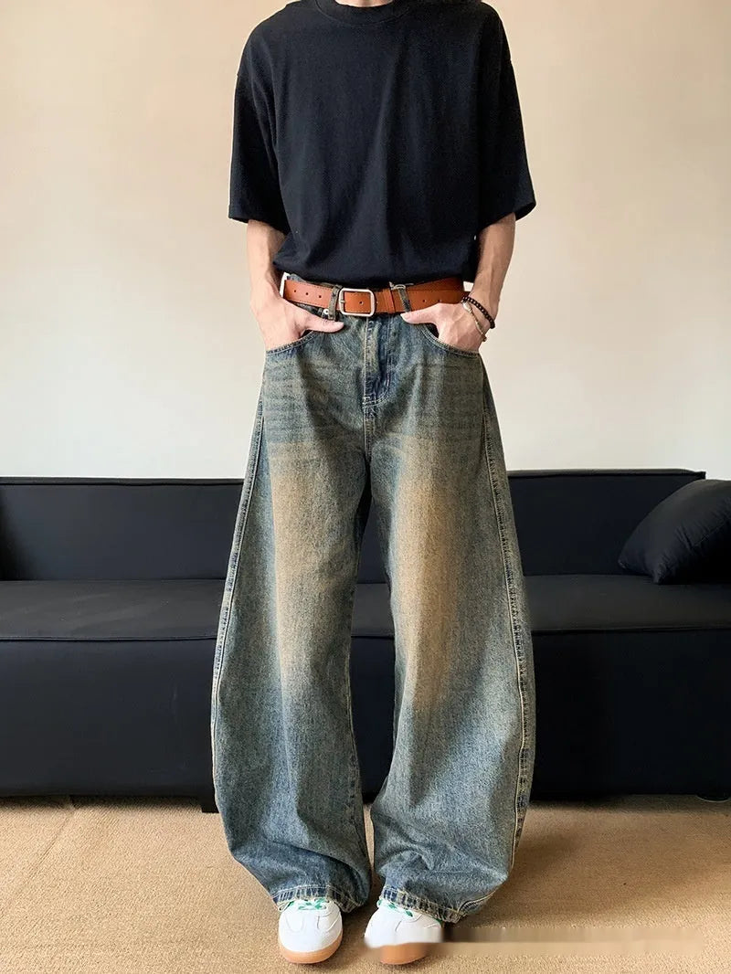 Men's retro blue distressed wide-leg denim trousers with machete styling detail