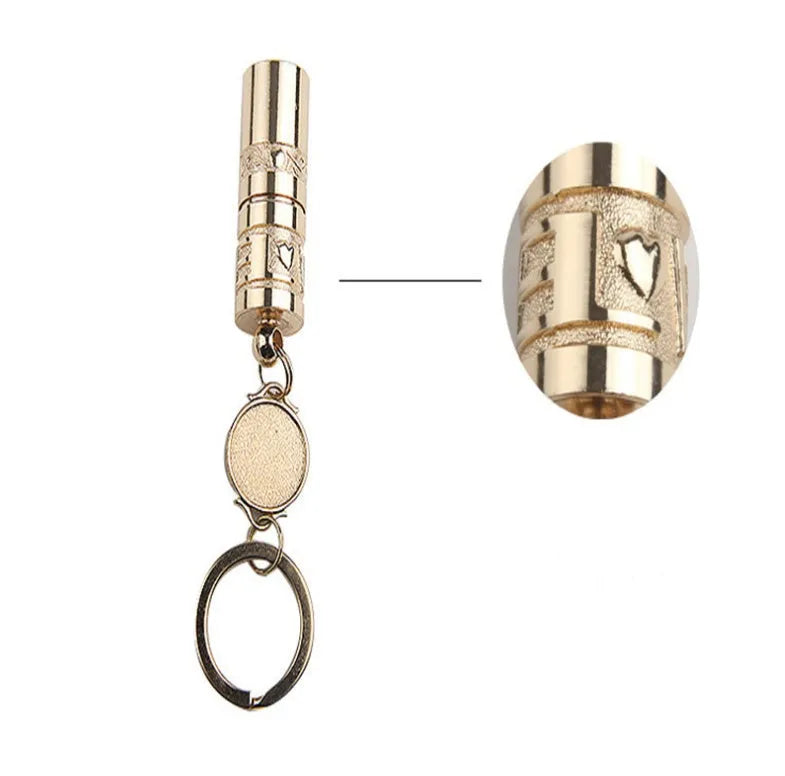 Gold zinc alloy LED flashlight attached to a keyring for outdoor and emergency use.