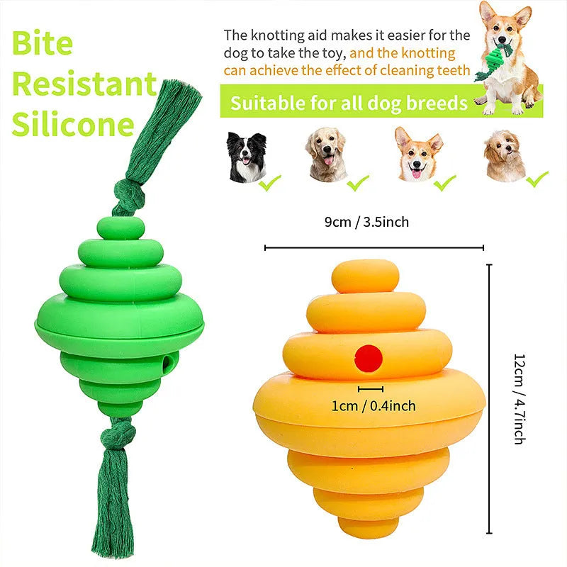 Green and yellow silicone dog ball with integrated rope, shown as a food-dispensing chew and tug toy.
