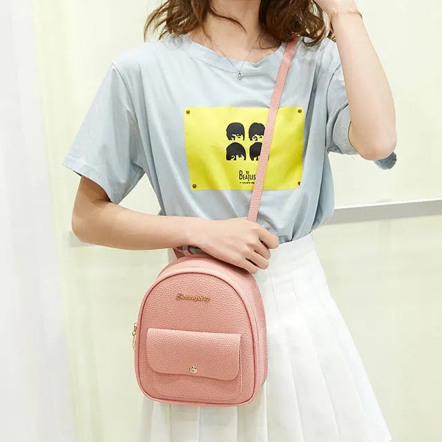 Women's small PU shoulder backpack purse in multiple colours with zipper closure