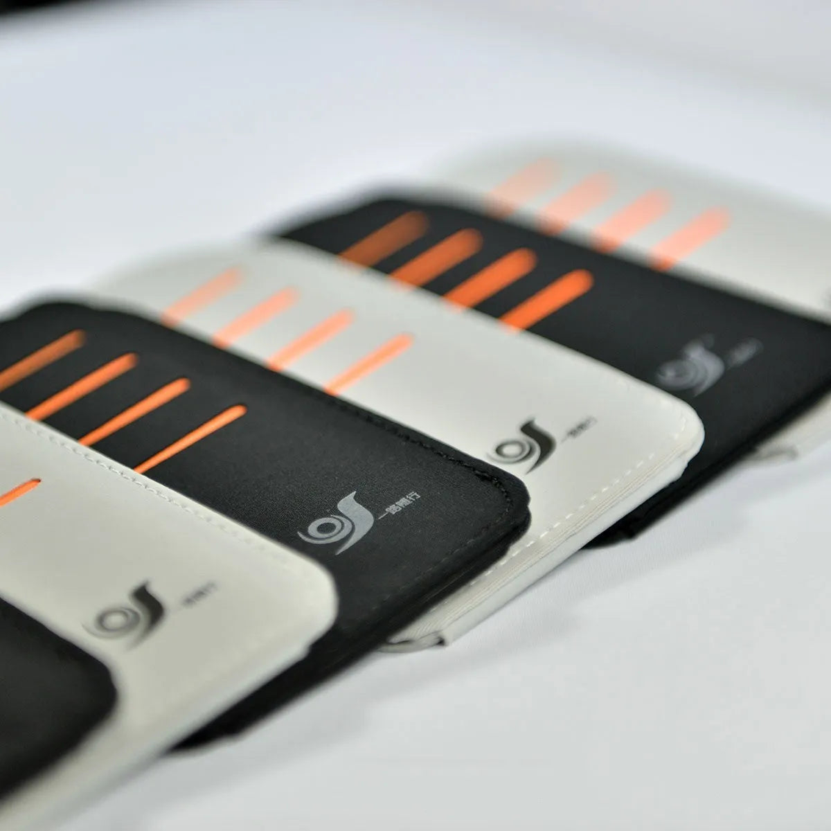 Set of four flexible car sun visor panels and a storage pouch for sun protection.