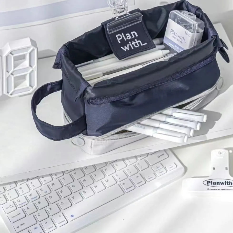 Polyester folding double-layer student pencil case in dark blue, blue, and cream white colour options.