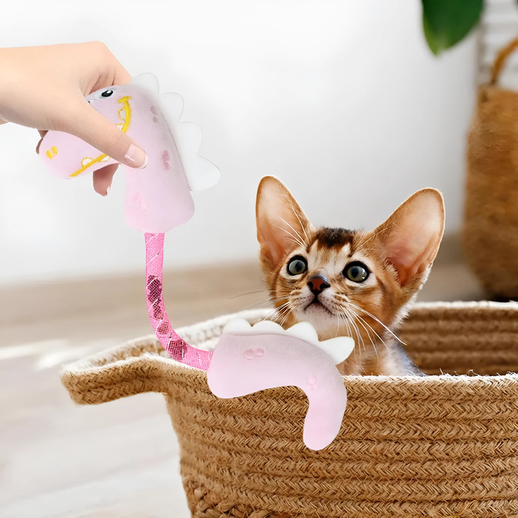 Set of four cat toys including rope, kicker toy, springs, and plush chew toys in pink, purple, or yellow colours