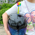 Silicone swinging sunflower decoration with suction cup for motorcycle and bicycle helmets.