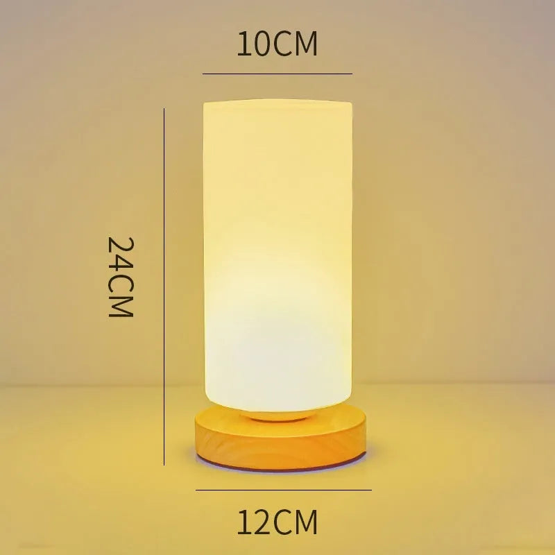 Nordic solid wood USB table lamp with touch dimming in white cube style on wooden surface