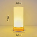 Nordic solid wood USB table lamp with touch dimming in white cube style on wooden surface