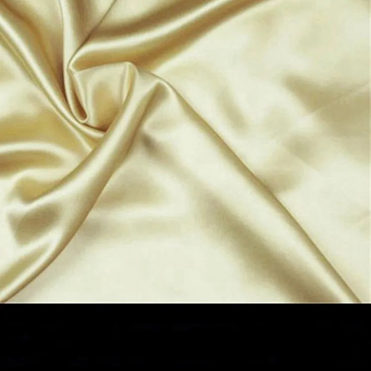 19 M double-sided silk pillowcase in apricot colour, showing envelope closure and smooth fabric texture.
