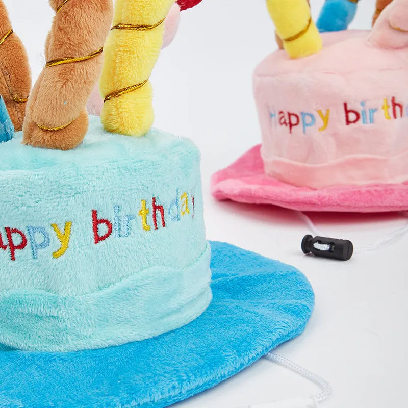 Blue dog birthday hat with elastic strap and decorative ball top for small dog.