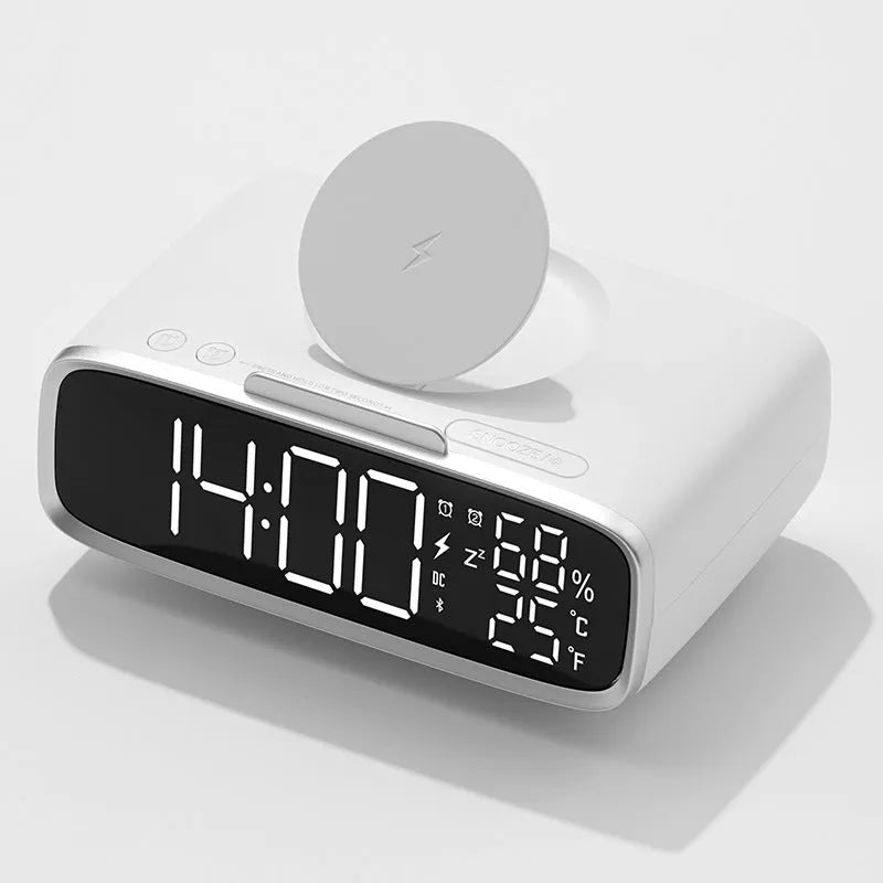 White wireless charging Bluetooth speaker with night light function on bedside table