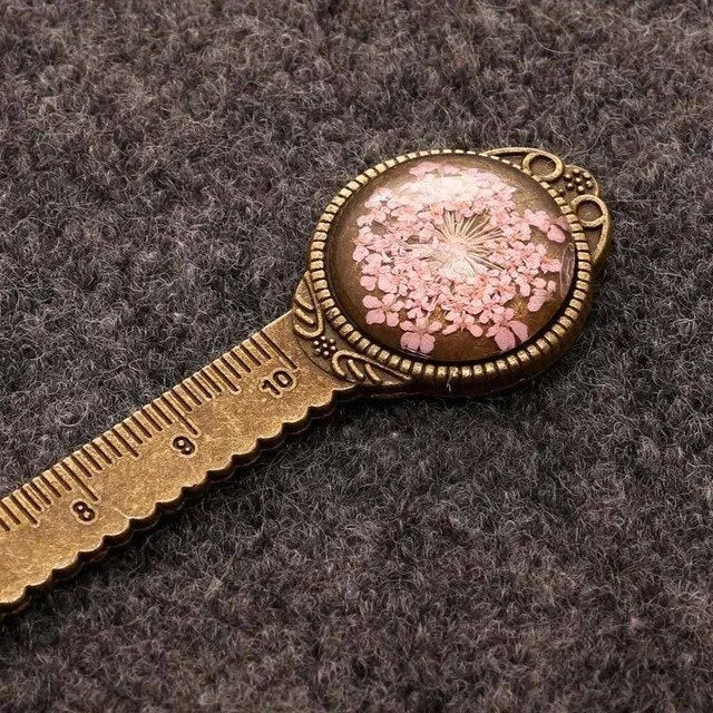 Handmade dried gypsophila flower bookmark ruler showing lace flowers, daffodils, and clovers on 12cm length