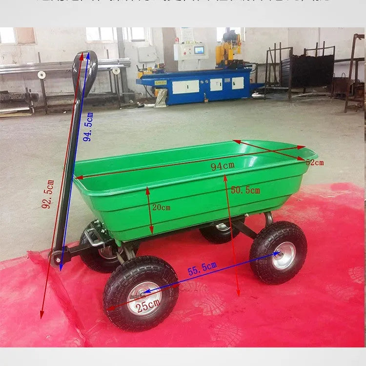 Green four-wheel steel and plastic dumptruck with a large hauling bed.