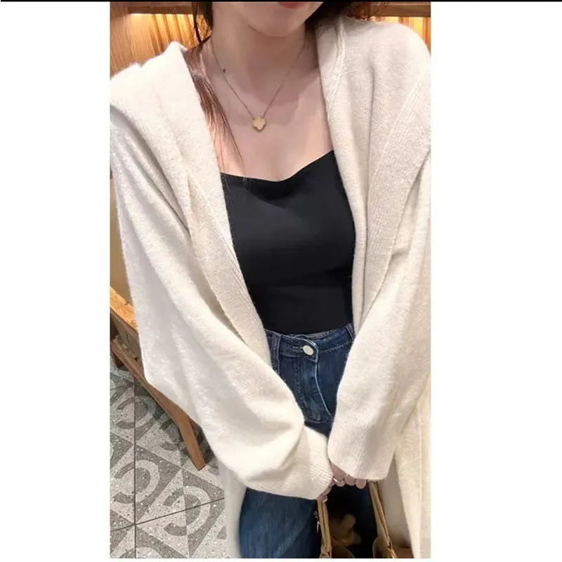 Korean style women's hooded knitted cardigan in wool blend fabric showing below-knee length and loose fit