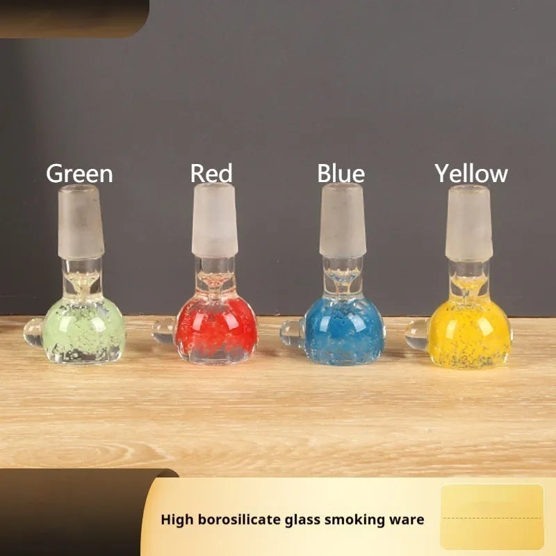 Transparent coloured glass tobacco pipe, trumpet shape, 7cm tall, on a plain background.
